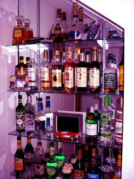 Bottles of various alcohols on shelves
