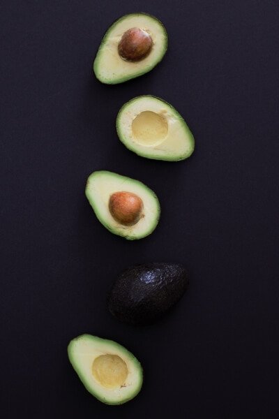 Halves of Hass avocados