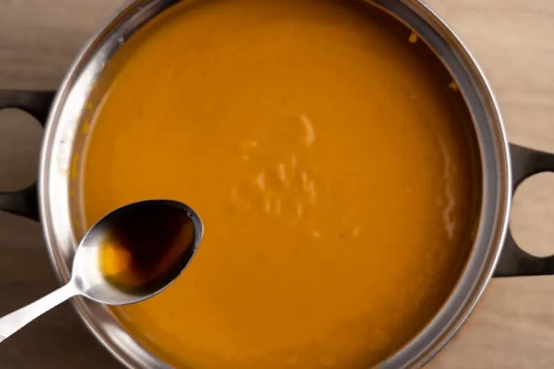 Adding maple syrup to butternut squash soup