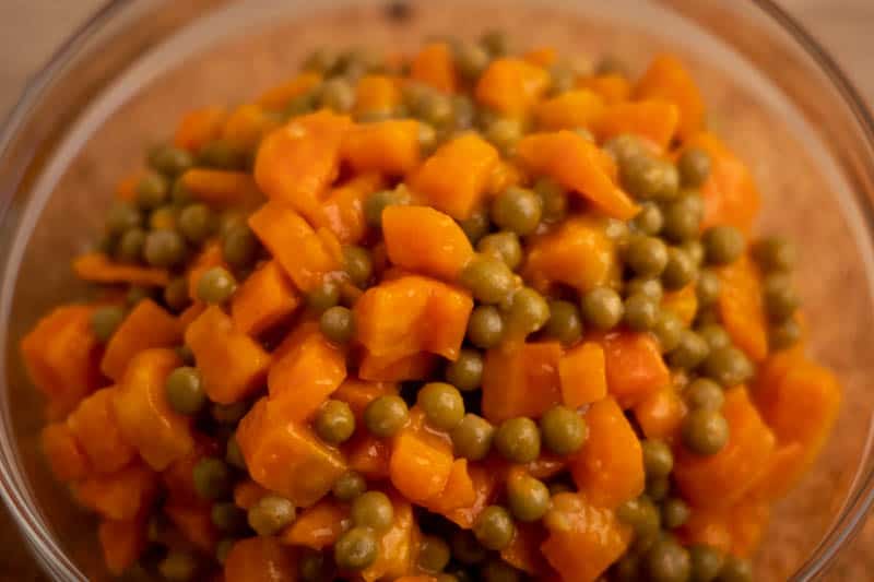 Carrots and peas salad in a bowl