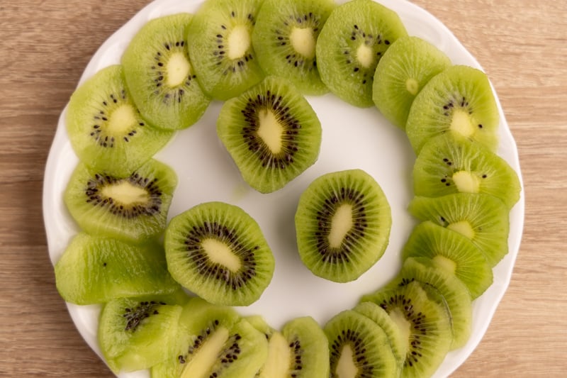 Cut kiwis on a plate