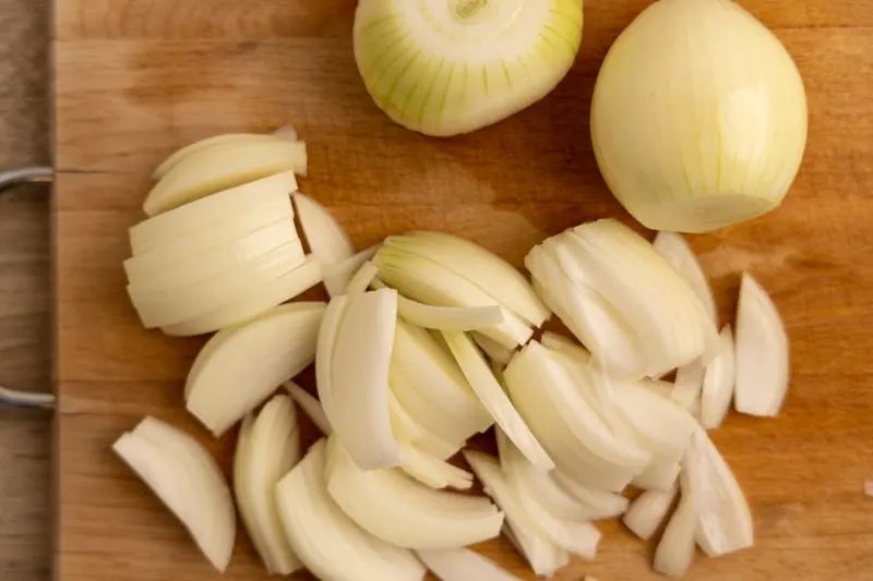 Cutting onions on a cutting board
