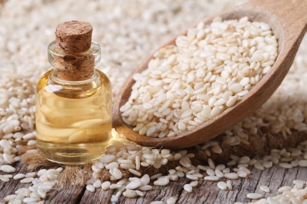 Fresh sesame oil in a small glass bottle