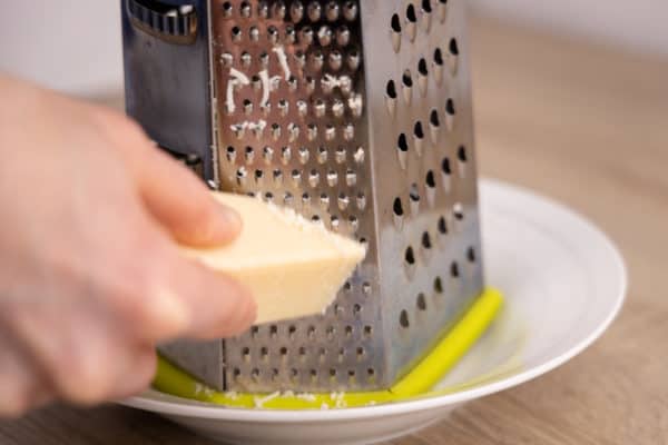 Grating parmesan cheese