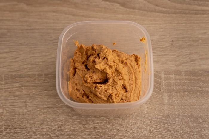 Hummus leftovers in an airtight container
