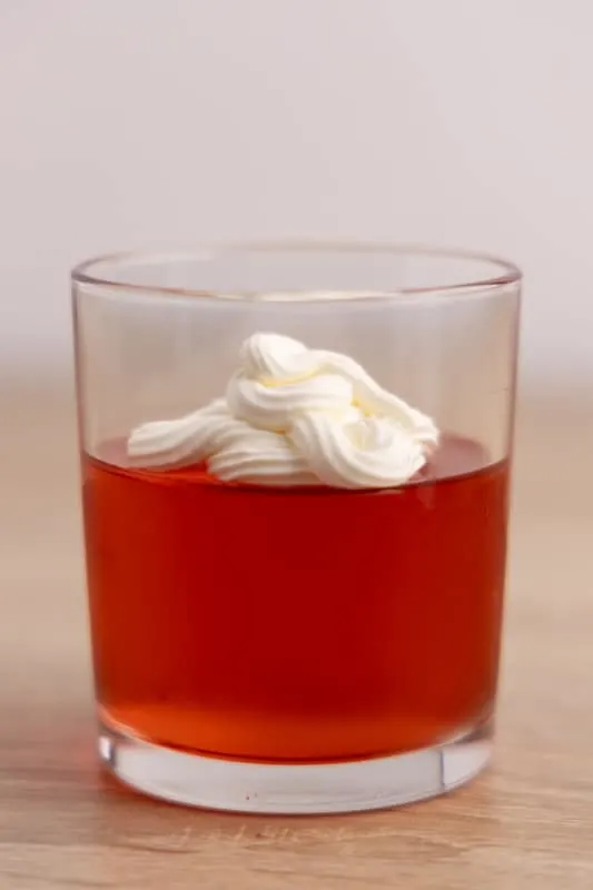 Jello topped with whipped cream