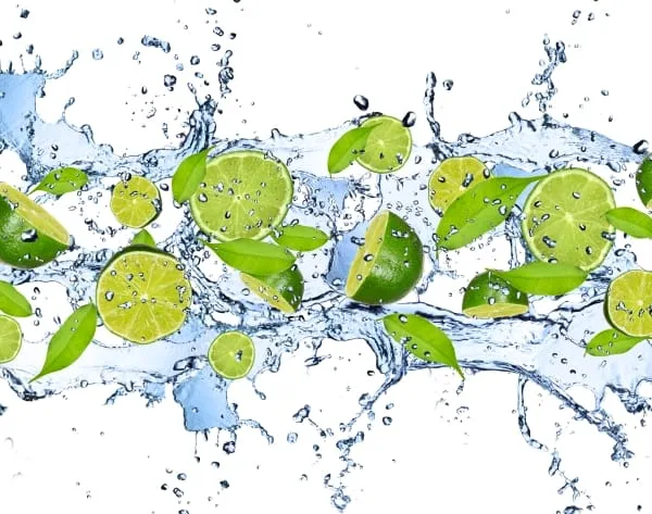 Limes in water splash