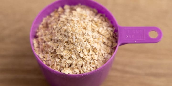 Measuring cup with oats