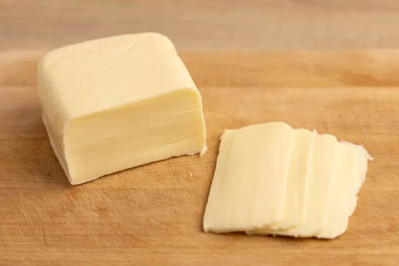 Mozzarella block on a cutting board