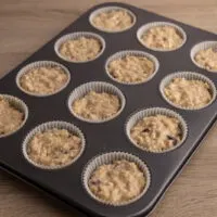 Muffin batter in baking liners