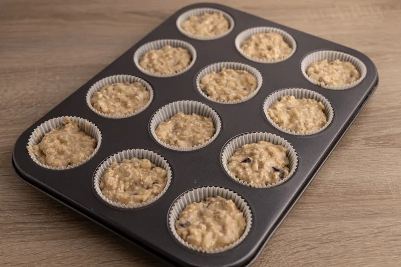 Muffin batter in baking liners