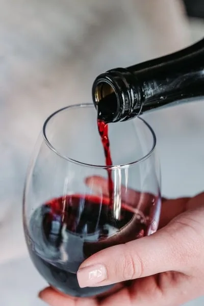 Pouring wine into a glass