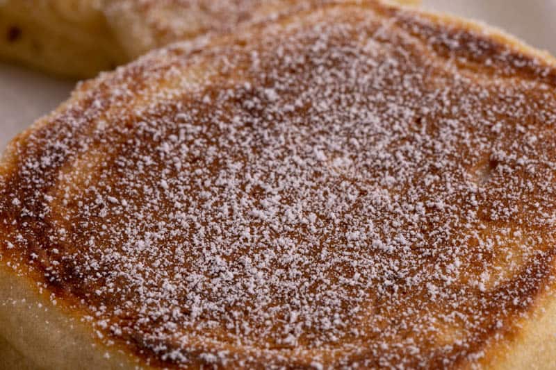 Powdered sugar on a pancake - closeup