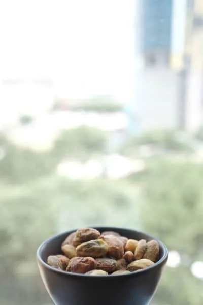 Shelled pistachios in a ceramic bowl