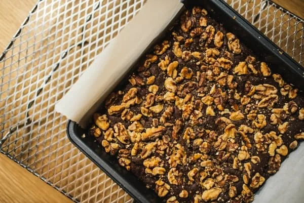 Shelled walnuts on a baking pan