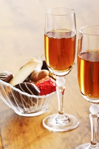 Sherry glasses and pralines in a bowl