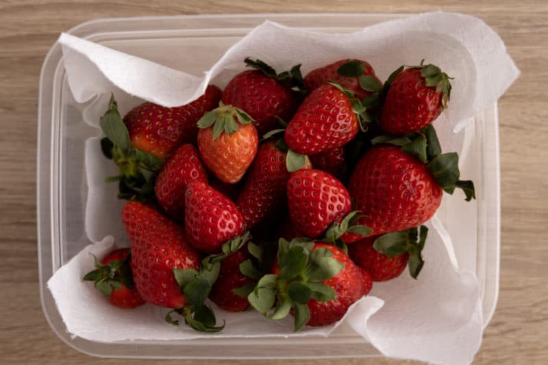 Strawberries in a plastic container