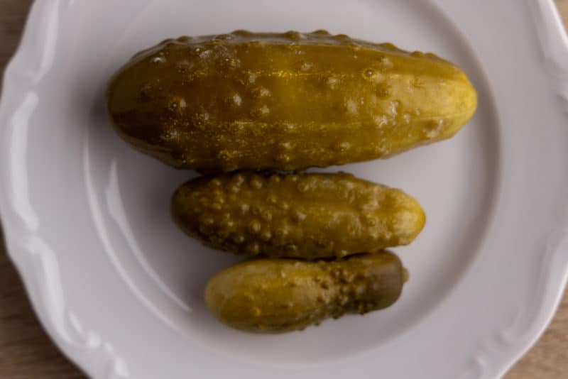 Three dill pickles