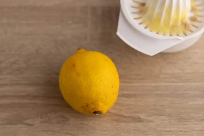 Whole lemon before juicing